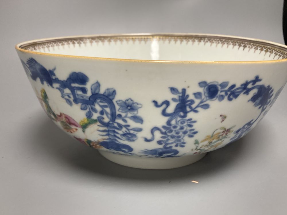 A Chinese famille rose punch bowl, Qianlong period, enamel painted in underglaze blue with famille rose enamels, figures in pavilions,